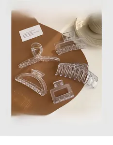 Detailed collection of clear acrylic shark hair clips in various geometric shapes