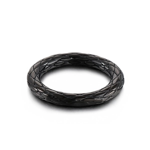 Minimalist black stainless steel ring with vintage diamond grid texture on white background