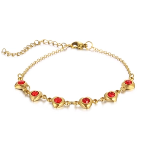 Golden stainless steel heart bracelet featuring five red zircon gemstones with lobster clasp