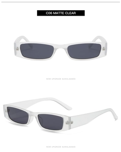 Detail view of matte clear rectangular sunglasses with dark grey lenses and full frame design