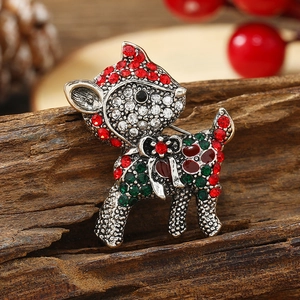 Elegant Christmas reindeer brooch with red and green rhinestones on silver metal