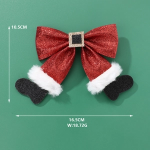 Red sequin Christmas bow hair clip with faux fur trim and gold buckle details