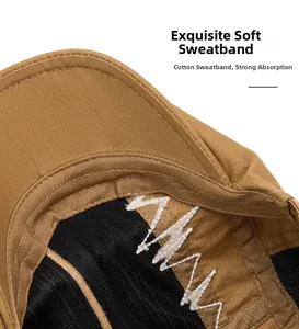 Detail shot of khaki cotton newsboy cap showing soft black wavy sweatband and neat stitching