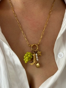 Detail view of 18K gold-plated paperclip chain with pearl and green grape charms