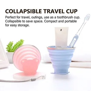 Portable silicone folding travel cups in pink and blue with a convenient hanging strap
