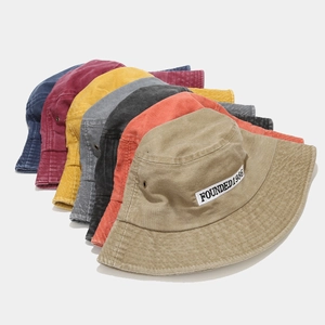 Washed cotton bucket hats in multiple vintage colors with FOUNDED1986 embroidery detail