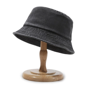 Vintage dark grey washed denim bucket hat with metal eyelets and reinforced brim edges