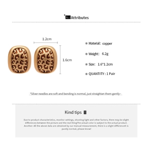 Detail view of leopard enamel oval earrings with product dimensions and material specs