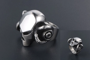 Macro view of Gothic steel ring with skull design and curved ram horns detail