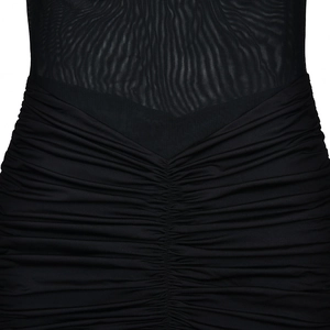 Detailed close-up of the black sheer mesh fabric and ruched texture of the dress