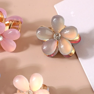 Chic resin flower hair clips with gold metal base and sparkling zircon accents for women