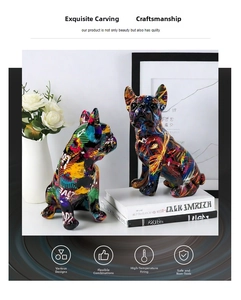 Detail of artistic graffiti bulldog statues in a modern home decor setting with white flowers