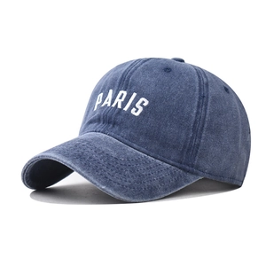 Navy blue washed cotton baseball cap with white PARIS embroidery in a vintage style