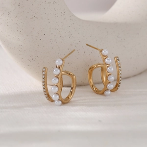 French vintage stainless steel earrings with pearls and zircons on elegant fabric
