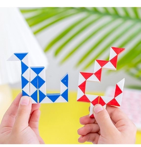 Close-up of blue and red magic snake puzzles being twisted into geometric shapes