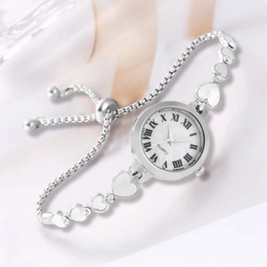 Elegant silver heart-link watch for women with roman numerals and adjustable slider buckle