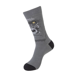 Macro shot of grey crew socks with black toe and heel featuring a detailed gorilla pattern