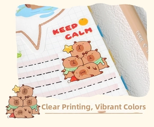 Close-up of cute Capybara waterproof PET stickers with stars on grid paper for DIY journal