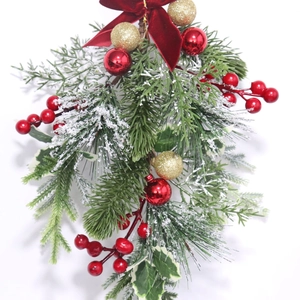 Inverted teardrop Christmas hanging decoration with red bow, pine needles and berries