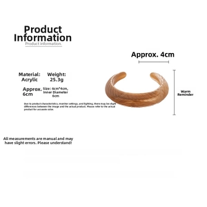 Detailed specs of beige marble acrylic cuff bracelet showing inner diameter of 6cm and 25.3g weight