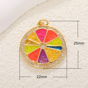 Macro view of crystal encrusted fruit pendant with measurements 25mm by 22mm