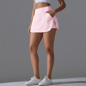 Detail view of pink sports skort with hidden safety shorts and functional side pocket
