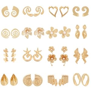 Collection of 16 pairs of vintage gold earrings with pearls and floral heart designs