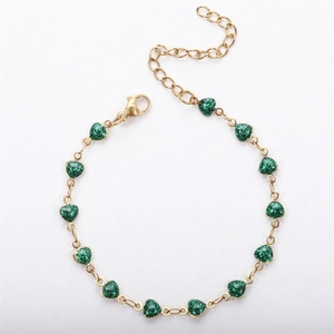 Golden chain bracelet with green glitter heart charms and adjustable lobster clasp