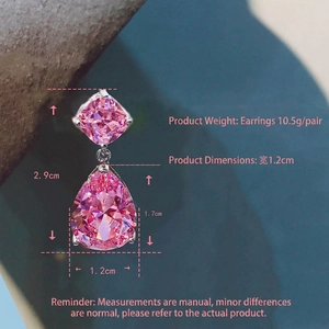 Pink crystal teardrop earrings with silver setting measuring 2.9cm in height