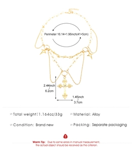 Detail view of gold layered necklace with cross and pearls including size dimensions