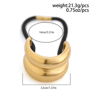 Macro view of metallic gold hair tie with precise dimensions and 21.3g weight details