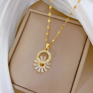 Macro shot of titanium steel flower necklace set with cubic zirconia in a jewelry box