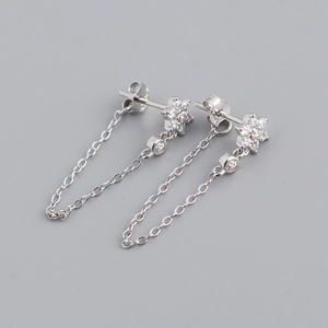 Detail of S925 sterling silver flower earrings with tassel chains and CZ diamonds