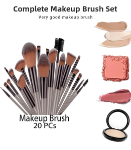 Detailed set of 20 professional makeup brushes with brown synthetic bristles and silver handles