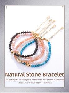 Detail of colorful natural stone bracelets with gold heart charms and adjustable chains