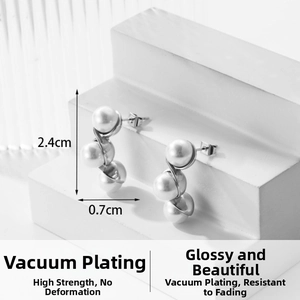 Detailed view of silver bow earrings with three pearls and dimensions 2.4cm by 0.7cm