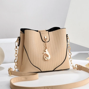 Elegant beige square handbag with vertical texture and gold chain strap for women