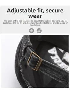 Detail of adjustable metal buckle and contrast stitching on washed cotton baseball cap