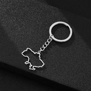 Detailed close-up of a silver stainless steel keychain featuring a Ukraine map outline