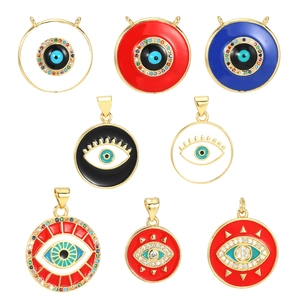 Enamel evil eye charms with cubic zirconia stones in various colors on gold base