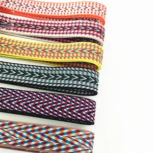 Close-up of colorful ethnic style jacquard woven shoulder straps with herringbone patterns