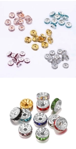 Macro shot of assorted rhinestone rondelle spacers in various metal finishes and colors
