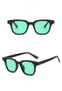 Front and side profile views of black frame sunglasses with green lenses on white background