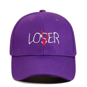 Detailed embroidery of LOSER text with red V on purple cotton baseball cap