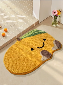Close-up of fluffy corn-shaped bath mat showing thick microfiber texture and non-slip backing