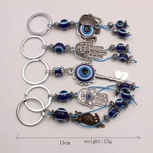 Blue Evil Eye keychains set with Hamsa Hand and Elephant charms, 13cm length
