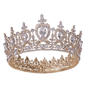 Detailed close-up of a golden bridal crown with sparkling heart-shaped rhinestones