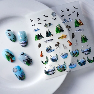 5D embossed nail stickers featuring fox, forest, and mountains pattern in blue and white