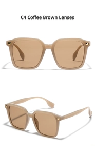 Detail view of large square oversized sunglasses in beige frames with brown lenses