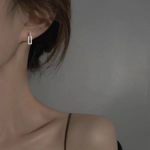 Minimalist silver geometric earrings for women with a sleek rectangular open hoop design